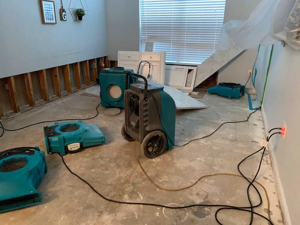 Dehumidifier in flood-cut room for Water Damage Restoration in Ocean Pines